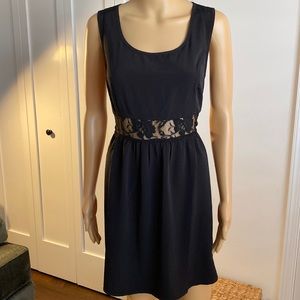 Black Lace Dress NWT. Sz L - peek-a-boo back and waist.